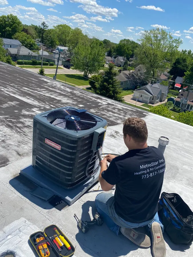 AC condenser service on a residential roof