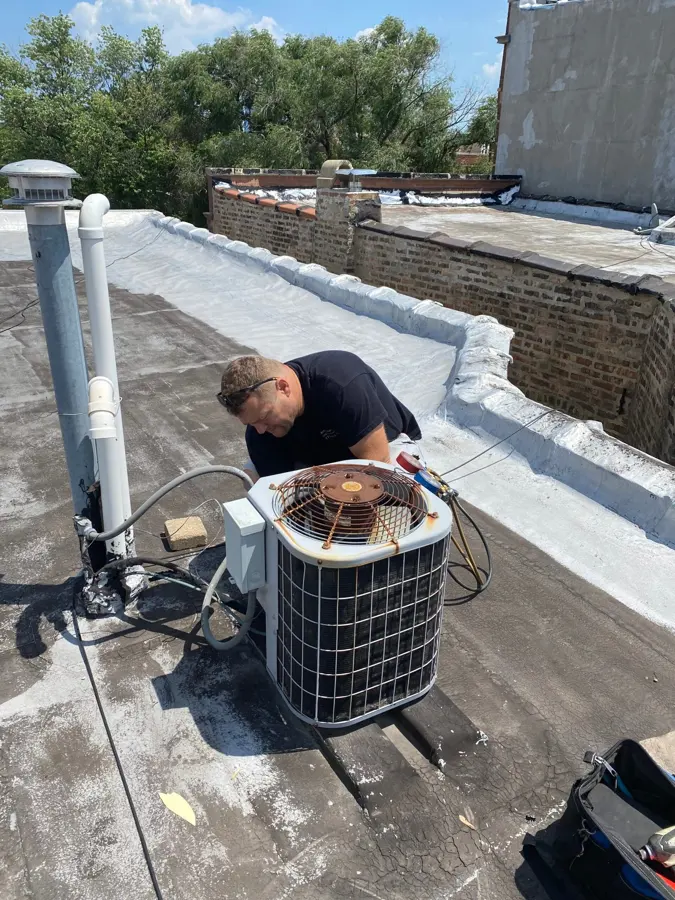 New AC condenser installed on a flat roof
